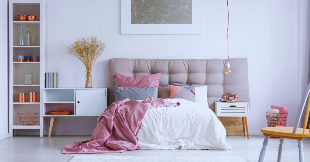 Statement Headboard as a Focal Point in Small Bedroom 