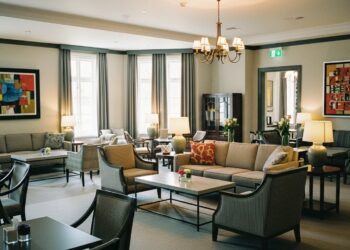 Modern drawing room design with stylish furniture, cozy lighting, and a harmonious color scheme.