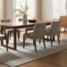 Modern dining room showing correct rug size under a rectangular dining table with chairs placed comfortably on the rug